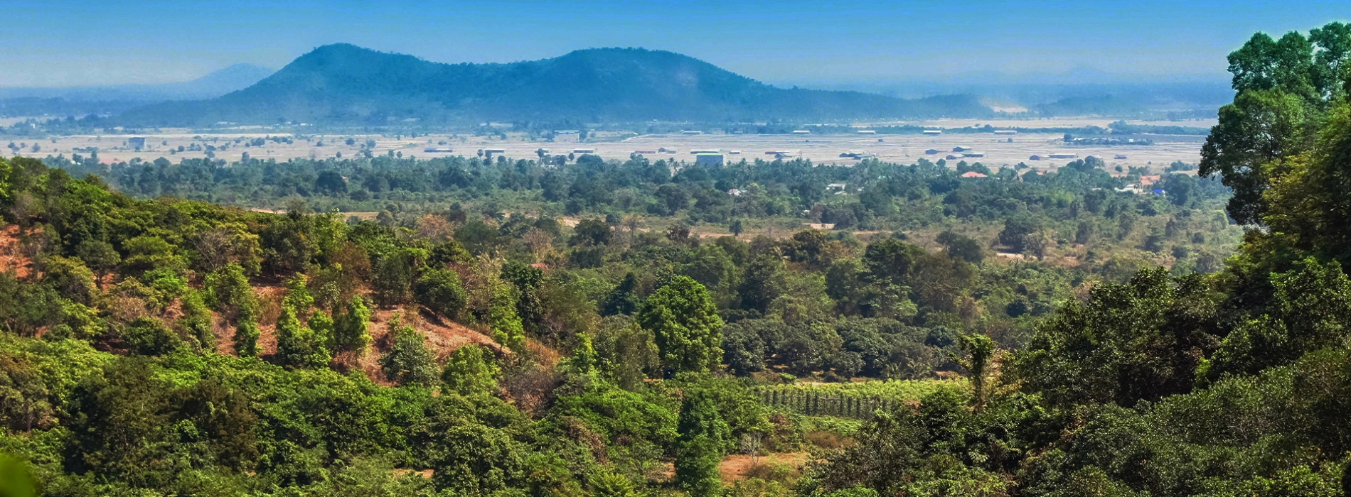 a view of a mountain range with a view of a city