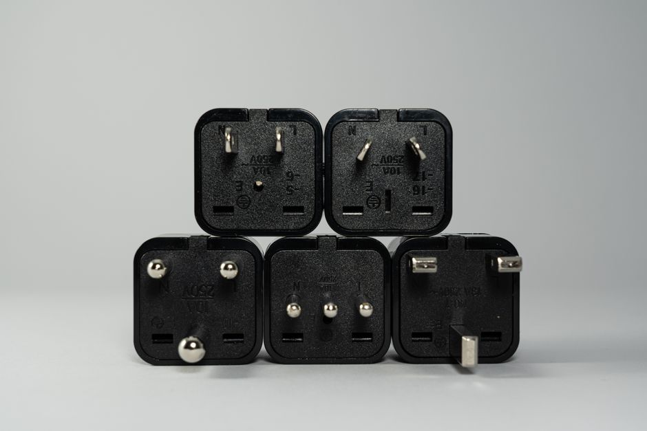 7. Gonine Universal Travel Plug Adapter with 5 USB