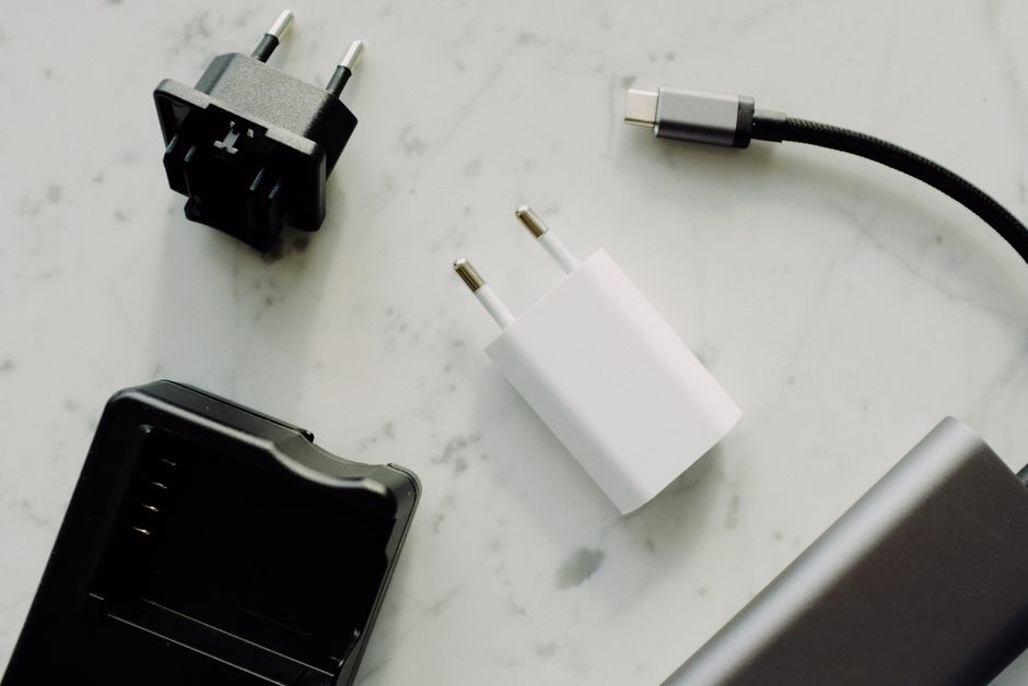 Do I need a travel adapter to charge headphones internationally?